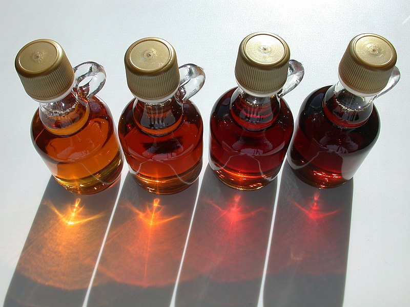 Varieties of maple syrup stored in jars